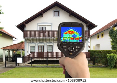 Detecting Heat Loss at the House With Infrared Thermal Camera Royalty-Free Stock Photo #108938912