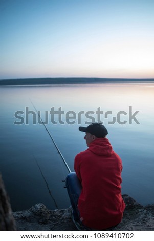 Fishing rod lake fisherman caucasian men sport summer lure sunset water outdoor suinset pond lake river fish