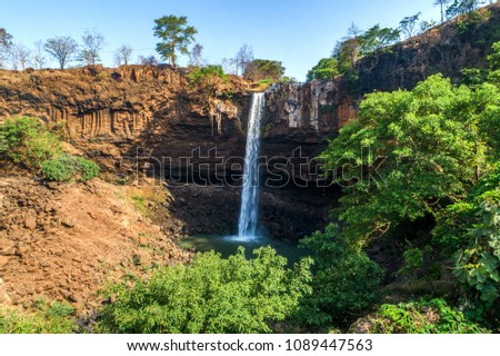 Aerial view of  Phu Cuong waterfall, Chu Se, Gia Lai, Vietnam. Phu Cuong waterfalls on the lava background of a volcano that has stopped working