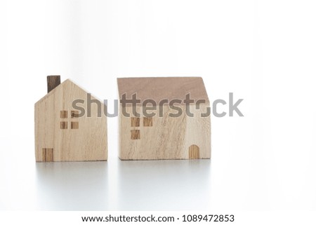 Miniature house on white background