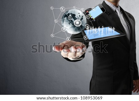 Technology in the hands of businessmen Royalty-Free Stock Photo #108953069