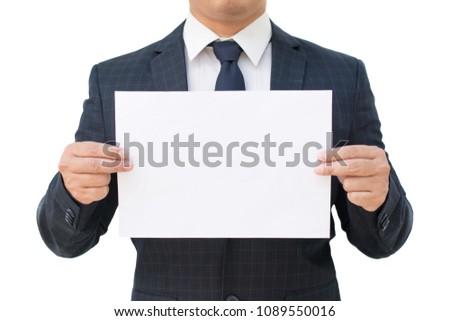 Business man in navy blue suit showing paper blank sheet a4 isolated on white background.
