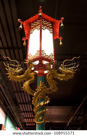 golden dragon on red lamp