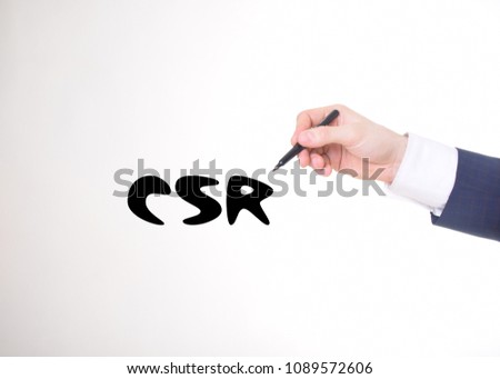 The businessman writes a black marker inscription:CSR