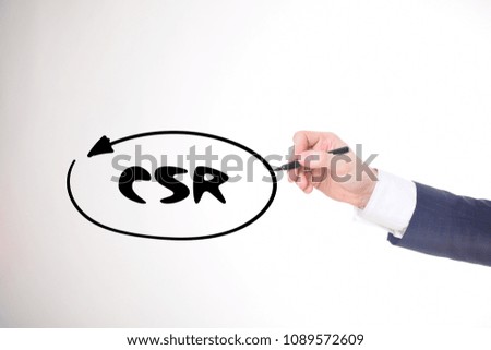 The businessman writes a black marker inscription:CSR