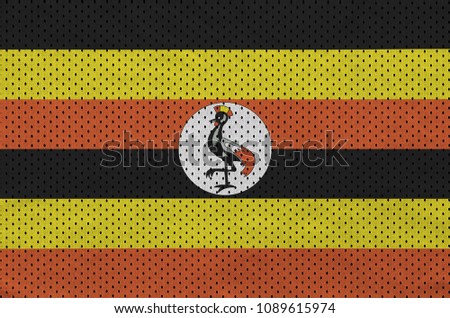 Uganda flag printed on a polyester nylon sportswear mesh fabric with some folds