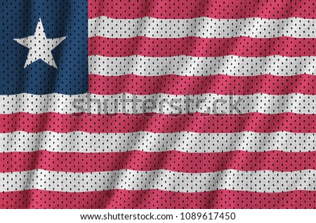 Liberia flag printed on a polyester nylon sportswear mesh fabric with some folds