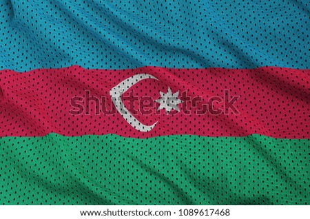 Azerbaijan flag printed on a polyester nylon sportswear mesh fabric with some folds
