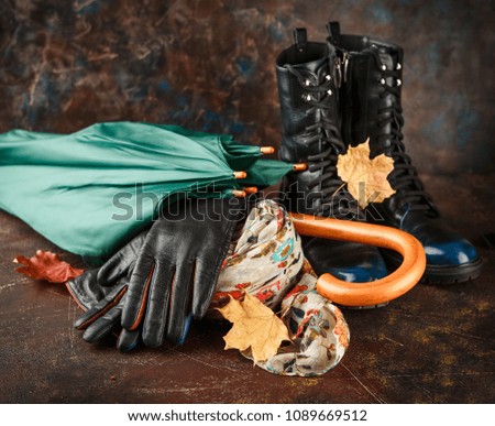 Fashion trend autumn winter. Autumn women's shoes, scarf, umbrella and gloves