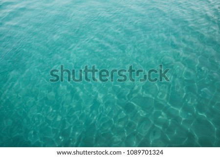 Movement background of rippled pattern of clean turquoise  tropical water 