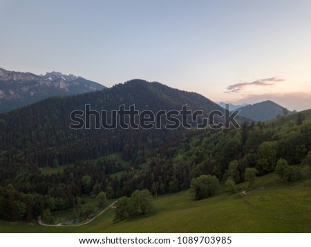 Amazing drone sunset view on Mountains of Bavaria in HDR.