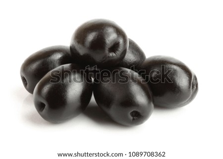 whole black olives isolated on white background macro