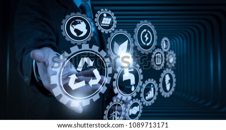 Sustainable development with icons of renewable energy and natural resources preservation with environment protection inside connected gears.business man with an open hand as showing something concept