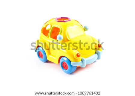 Yellow toy car isolated on white background