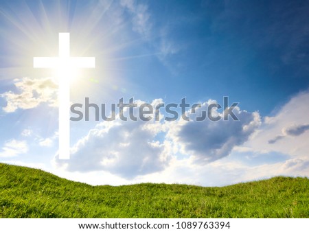 wood cross on blue sky. religion concept