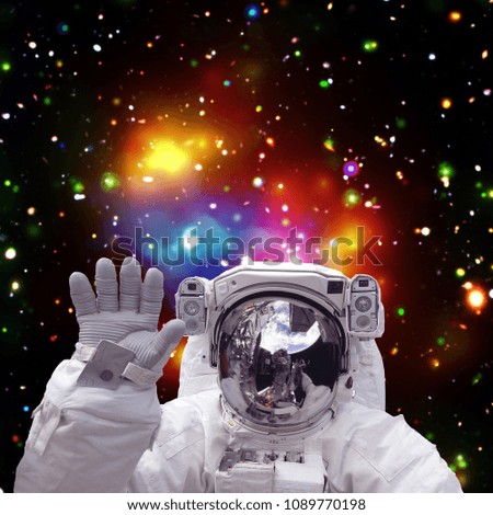 Astronaut in outer space. The elements of this image furnished by NASA.
