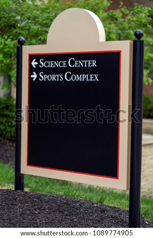 College University Direction Sign