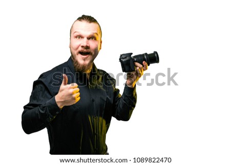 Handsome young photographer on white background