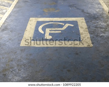 Dirty disabled parking signs