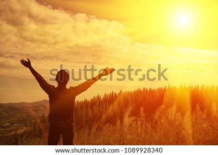 Thank god He raised his arms to look at the sky. Royalty-Free Stock Photo #1089928340