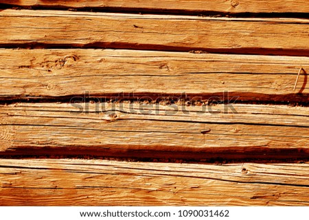 Wooden fence pattern in orange color. Abstract background and texture for design.