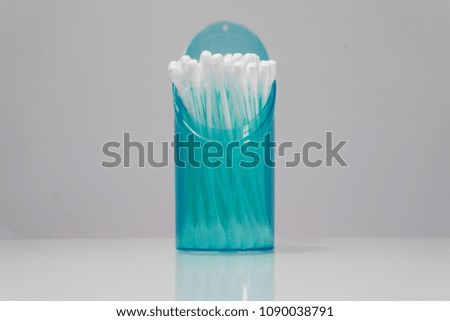Eared sticks in a case on a white background