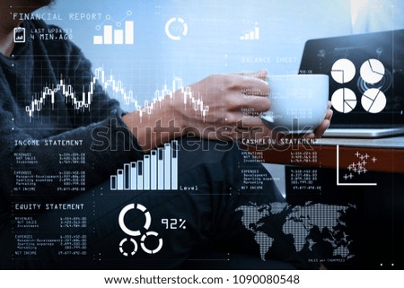 Financial report data of business operations (balance sheet and  income statement and diagram) as Fintech concept.success businessman hand using smart phone and coffee cup on wooden desk.