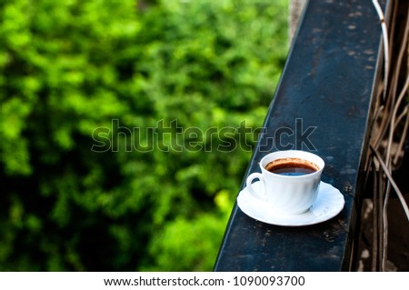 Take a picture of coffee cups on different backgrounds

