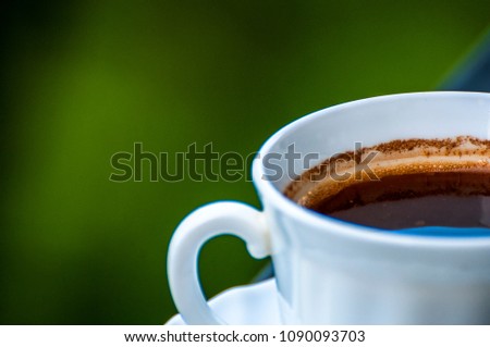 Take a picture of coffee cups on different backgrounds
