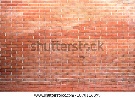 The background of the brick wall is beautifully arranged. Ancient brick wall Grunge background The backdrop may be used in interior design.