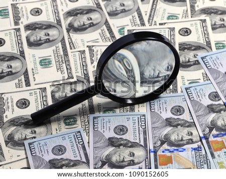 Determination of the authenticity of American paper money dollars using a magnifying glass