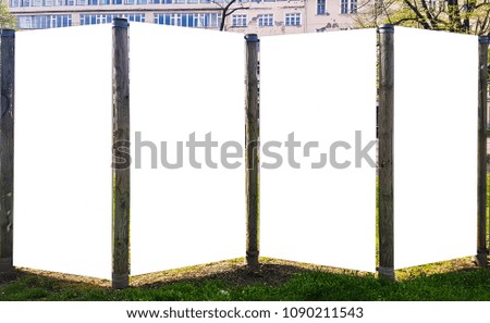 Four Large Outdoor White Blank Advertisement Stand Banner Mock Up in City Park. Isolated Template Clipping Path