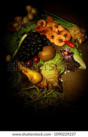 Face of vegetables, berries and fruits.