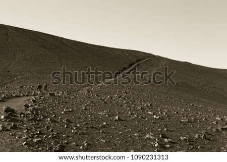 Gravel road on the beautiful landscape in the east of Iceland. Toned.