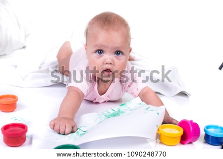 Colorful painted hands in a beautiful young girl. isolated on white background.