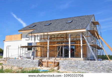 Renovation house with asphalt shingles roofing construction, painting wall, stucco, wall repair, attic insulation, attic skylight windows.