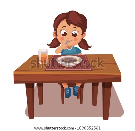 girl ate all the food. tasty meal, good appetite. child sits at table and eats. licking the spoon, empty plate