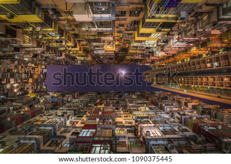 Overcrowded residential building in Hong Kong Royalty-Free Stock Photo #1090375445
