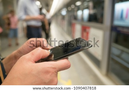woman using cellphone, closeup image