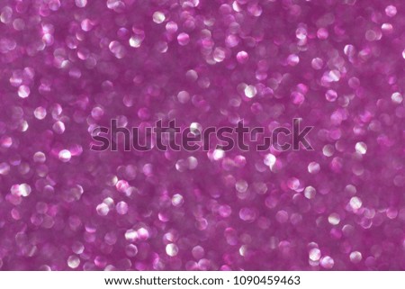 abstract bright purple bokeh lights background , defocused background