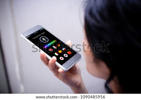 voice translation concept.Close-up of female talking on her mobile phone