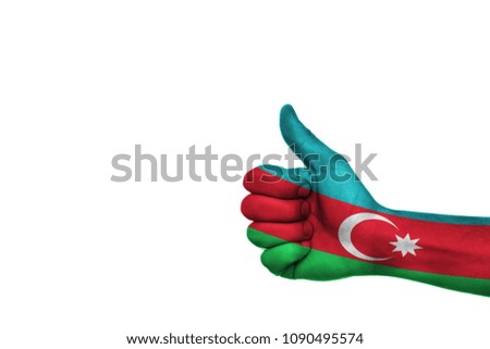
painted thumb up in colors of the flag of Azerbajian