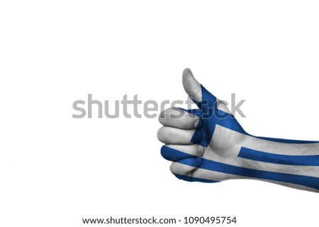 
painted thumb up in colors of the flag of Greece