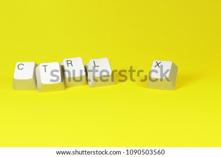 Plastic keyboard keys showing messages and commands, ideal for your tech projects or computer publications.