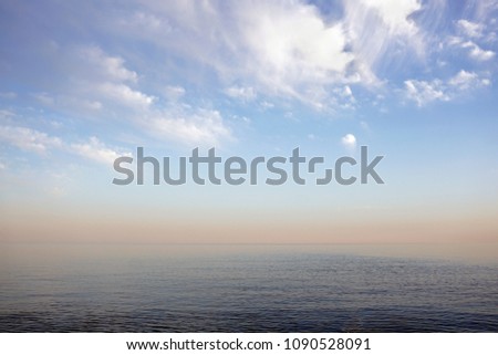 sea and red sunset with clouds, background
