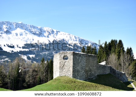 Ruins of an ancient church over a hill where you can enjoy a beautiful view. Sumvitg, Switzerland. Royalty-Free Stock Photo #1090608872