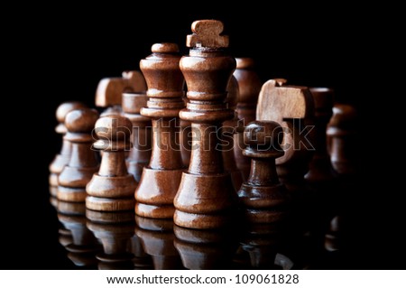 chess pieces isolated on a black background