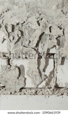 The old,white, grey grunge concrete texture or background. Copy space. graphical resource. Vertical
