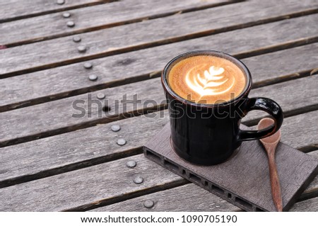 Good morning with coffee on table wooden.