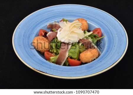 salad with tomatoes, smoked ham,cheese and mayonnaise
